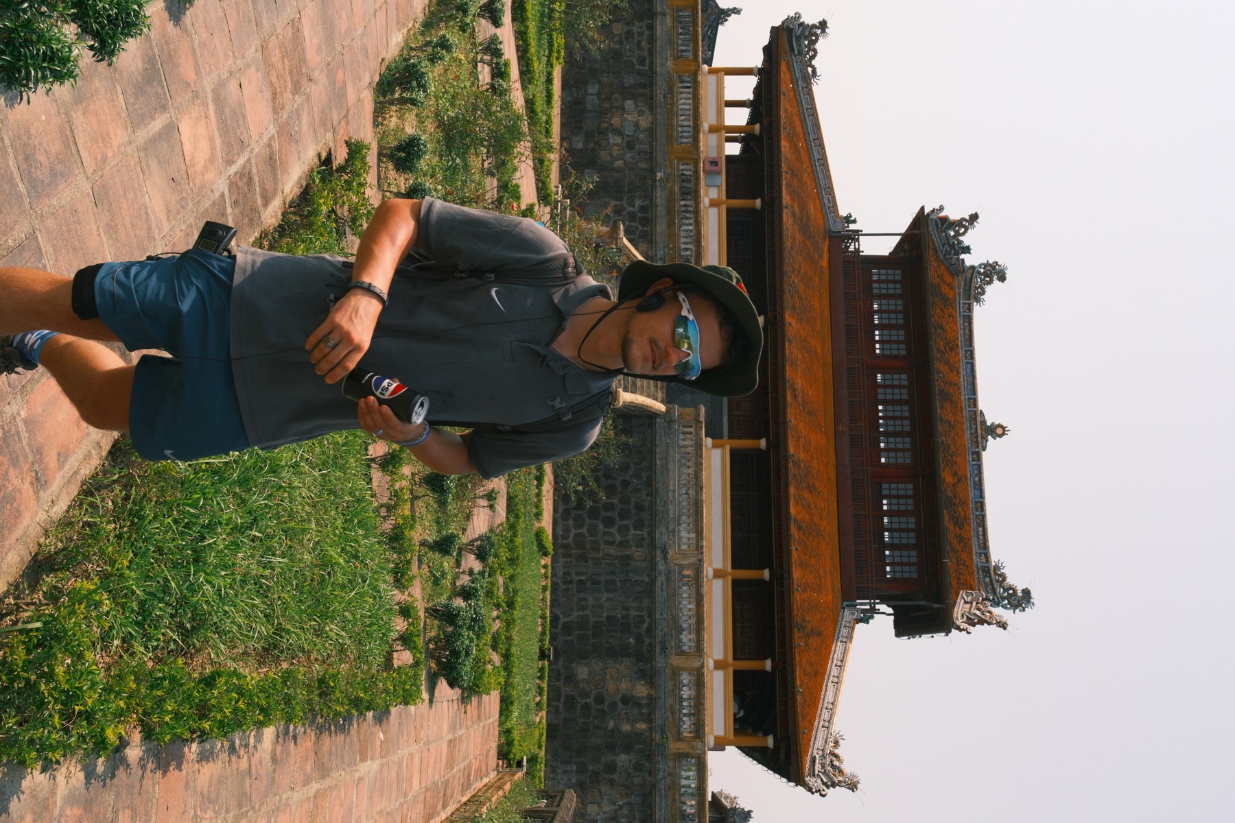 Ollie exploring a historic site while backpacking in Southeast Asia